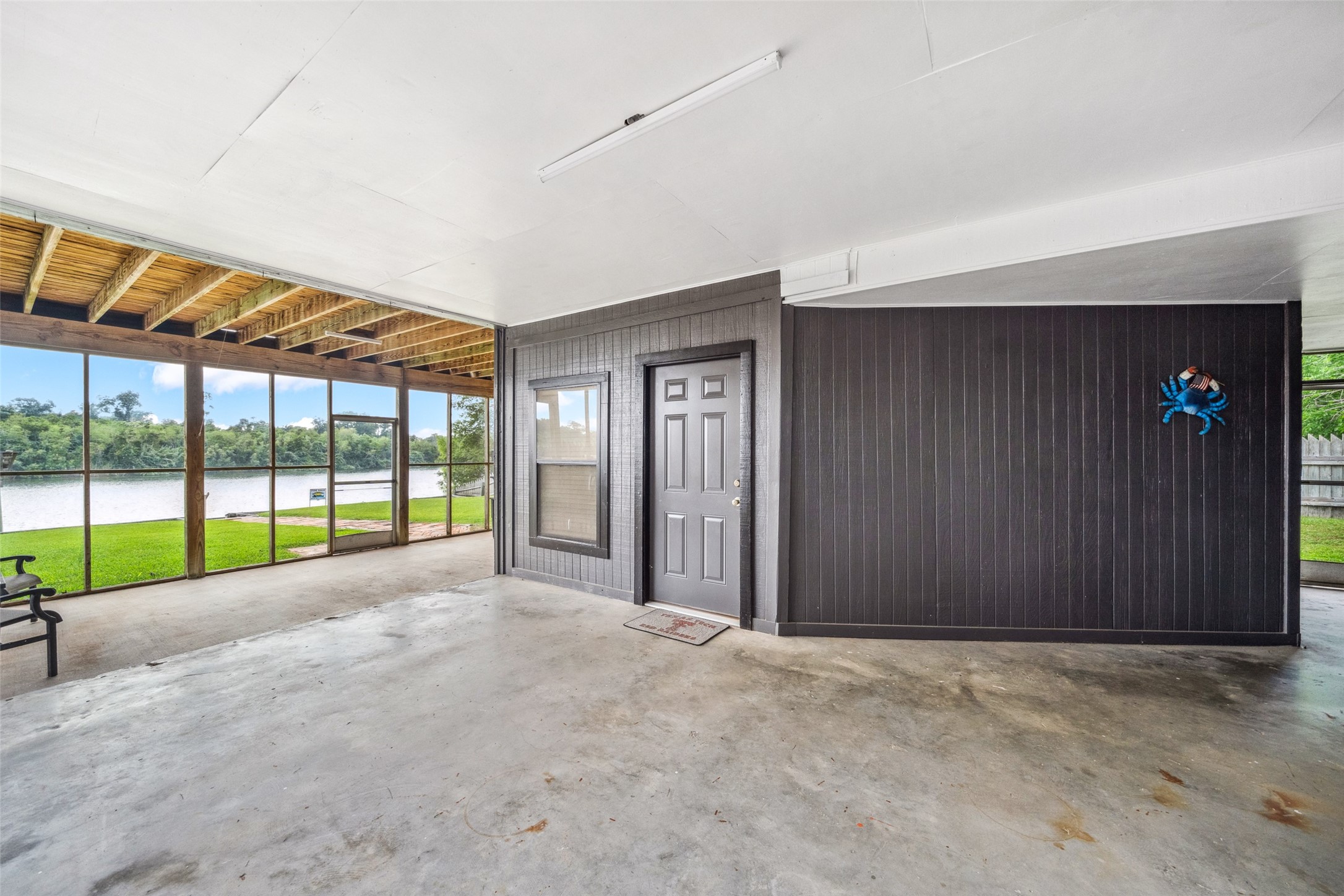215 Selkirk Road Bay City, TX 77414 - Photo 4 of 36 a view of an empty room with a sliding door