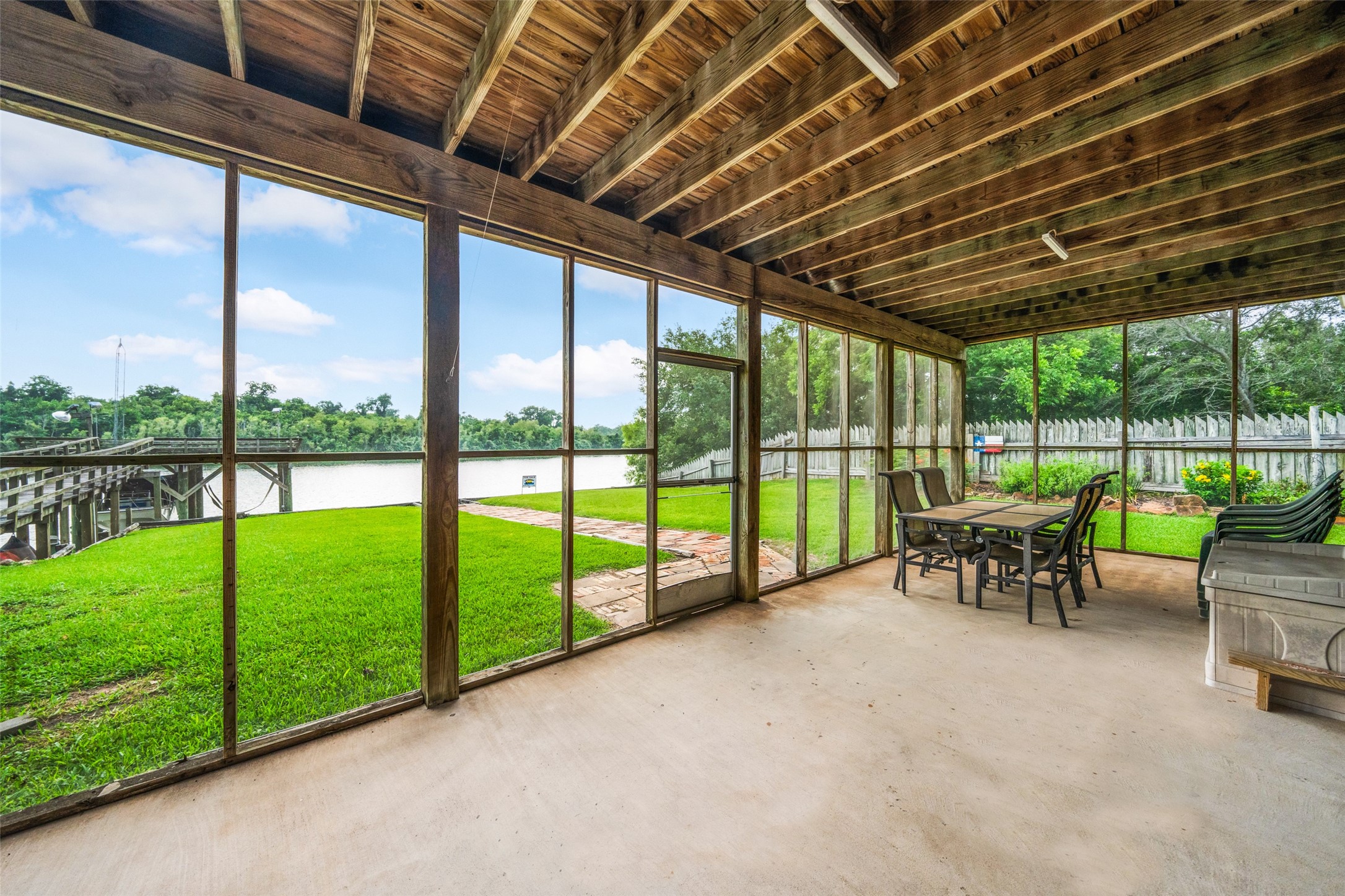 215 Selkirk Road Bay City, TX 77414 - Photo 5 of 36 a view of a yard with porch and outdoor seating