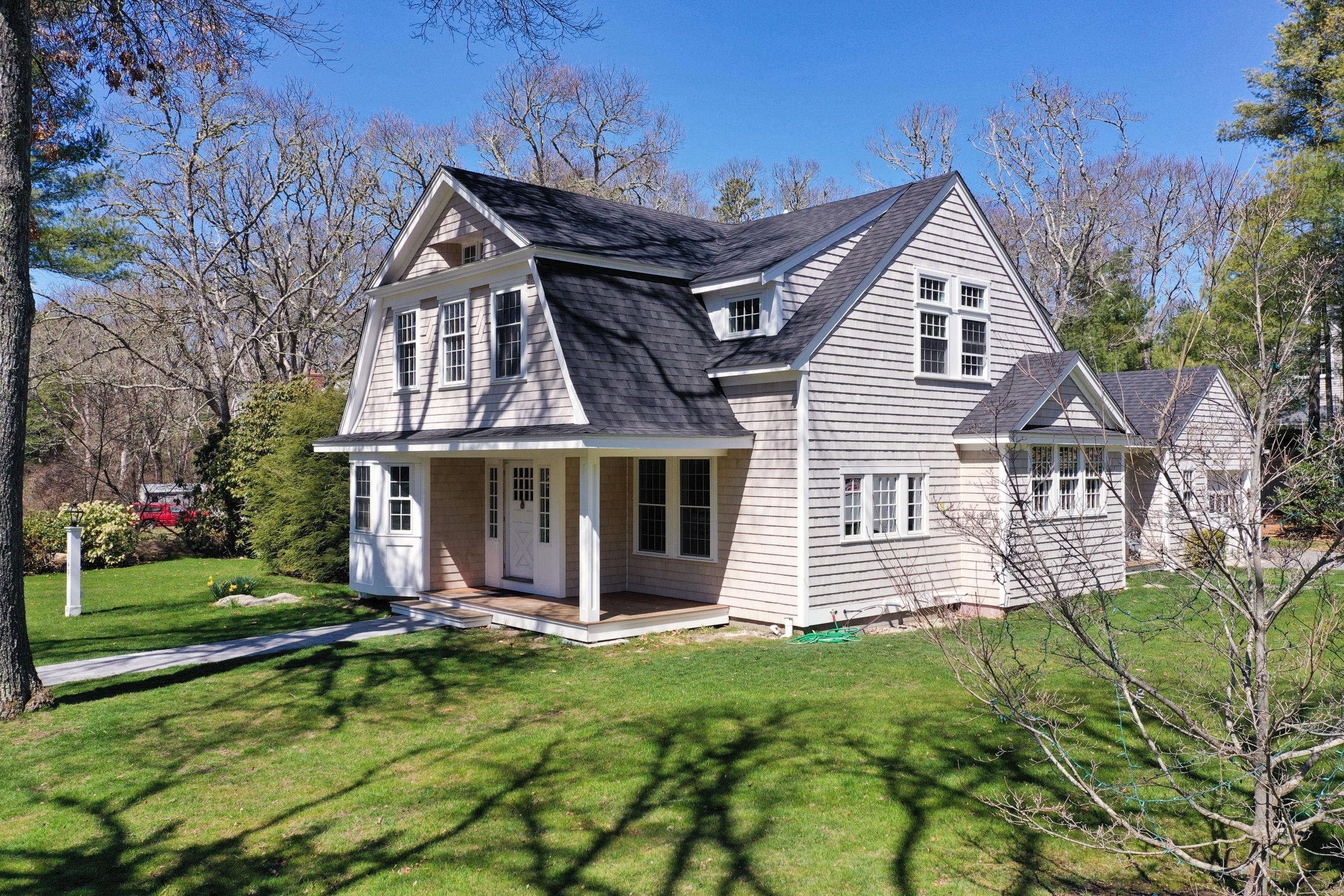 front view of a house with a yard