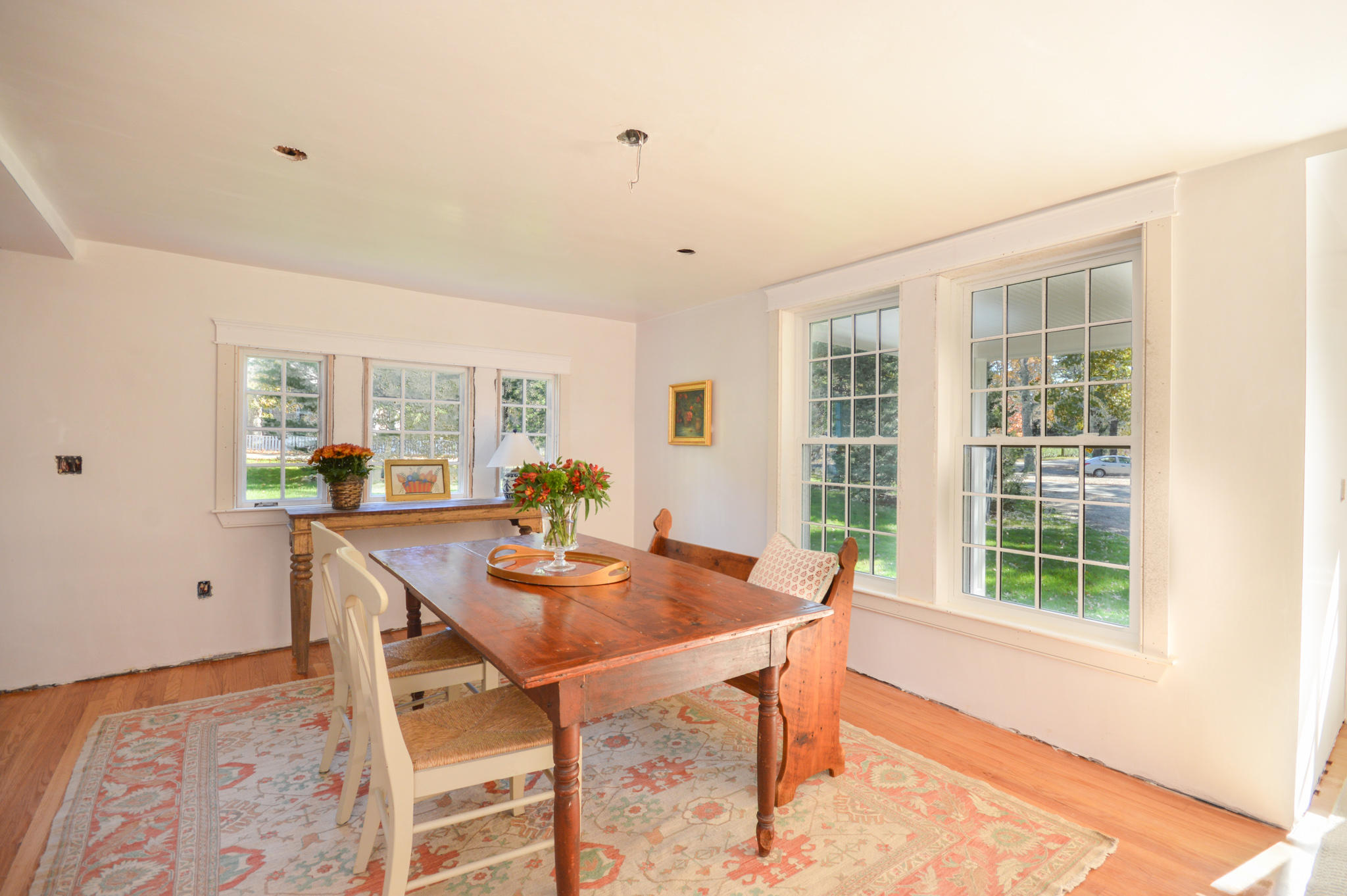 140 Scraggy Neck Road Cataumet, MA 02534 - Photo 16 of 39 a workspace with furniture and a potted plant