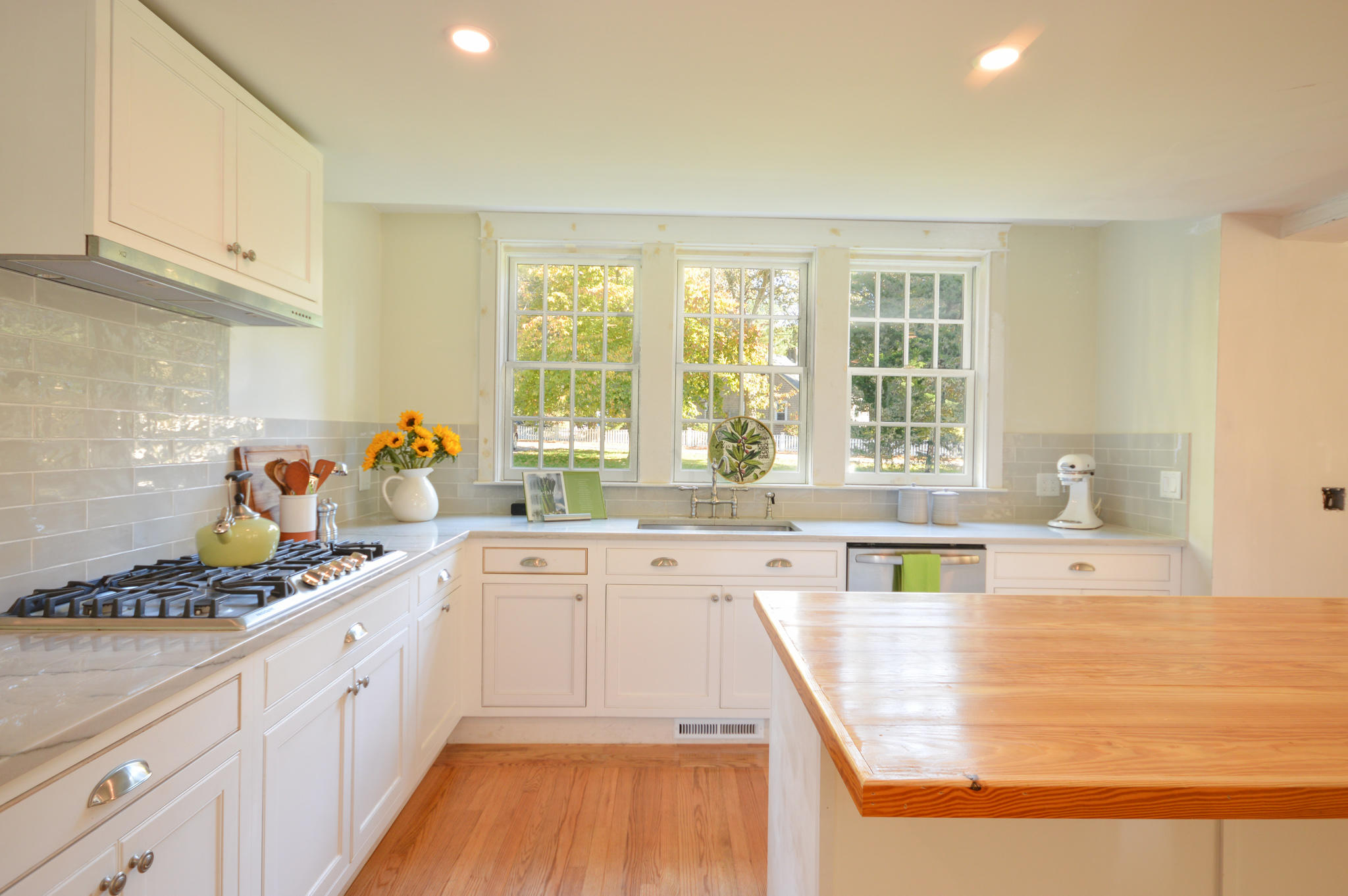 140 Scraggy Neck Road Cataumet, MA 02534 - Photo 18 of 39 a kitchen with stainless steel appliances granite countertop a sink and cabinets