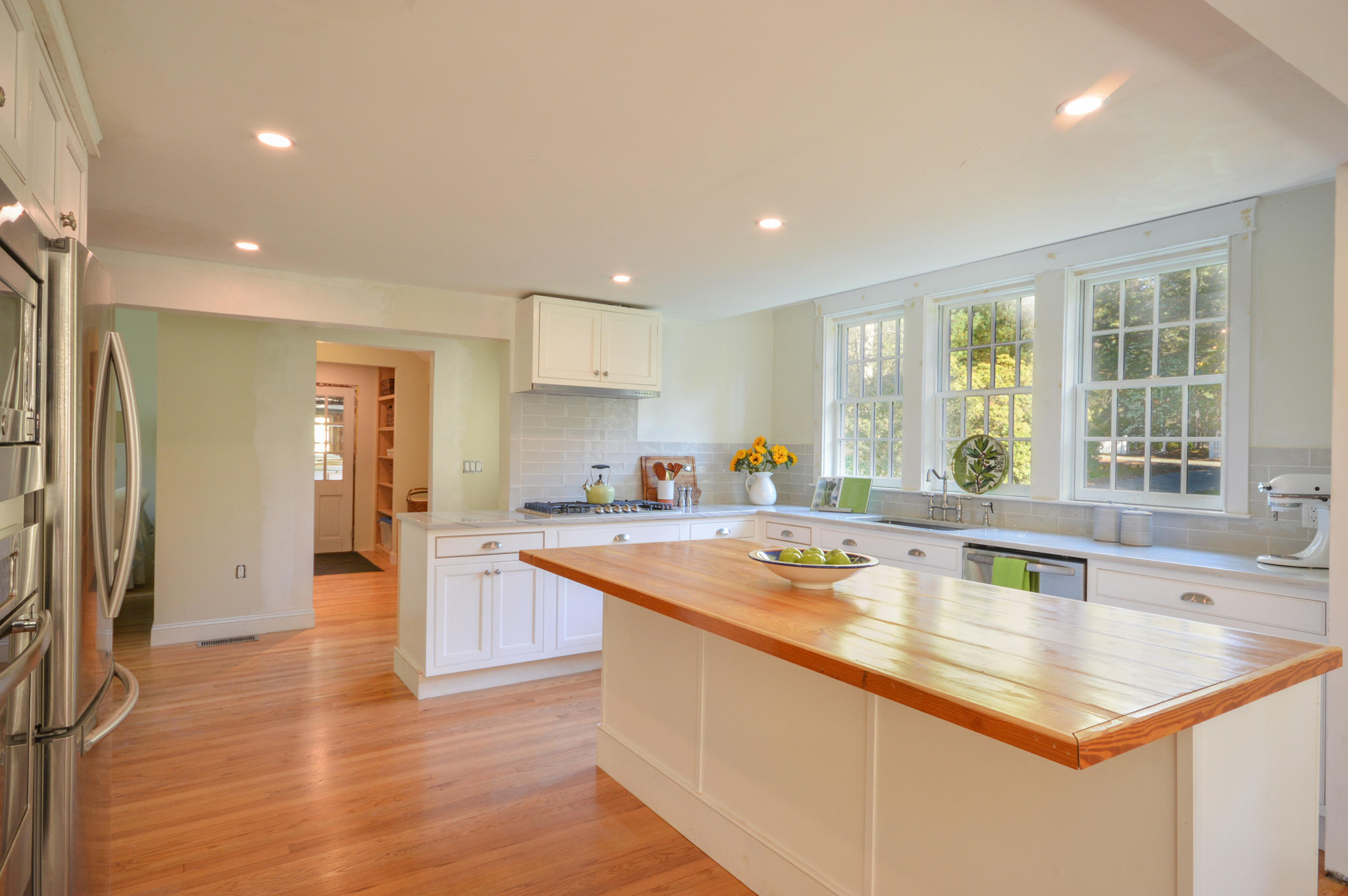 140 Scraggy Neck Road Cataumet, MA 02534 - Photo 20 of 39 a kitchen with stainless steel appliances granite countertop a sink and a counter top space