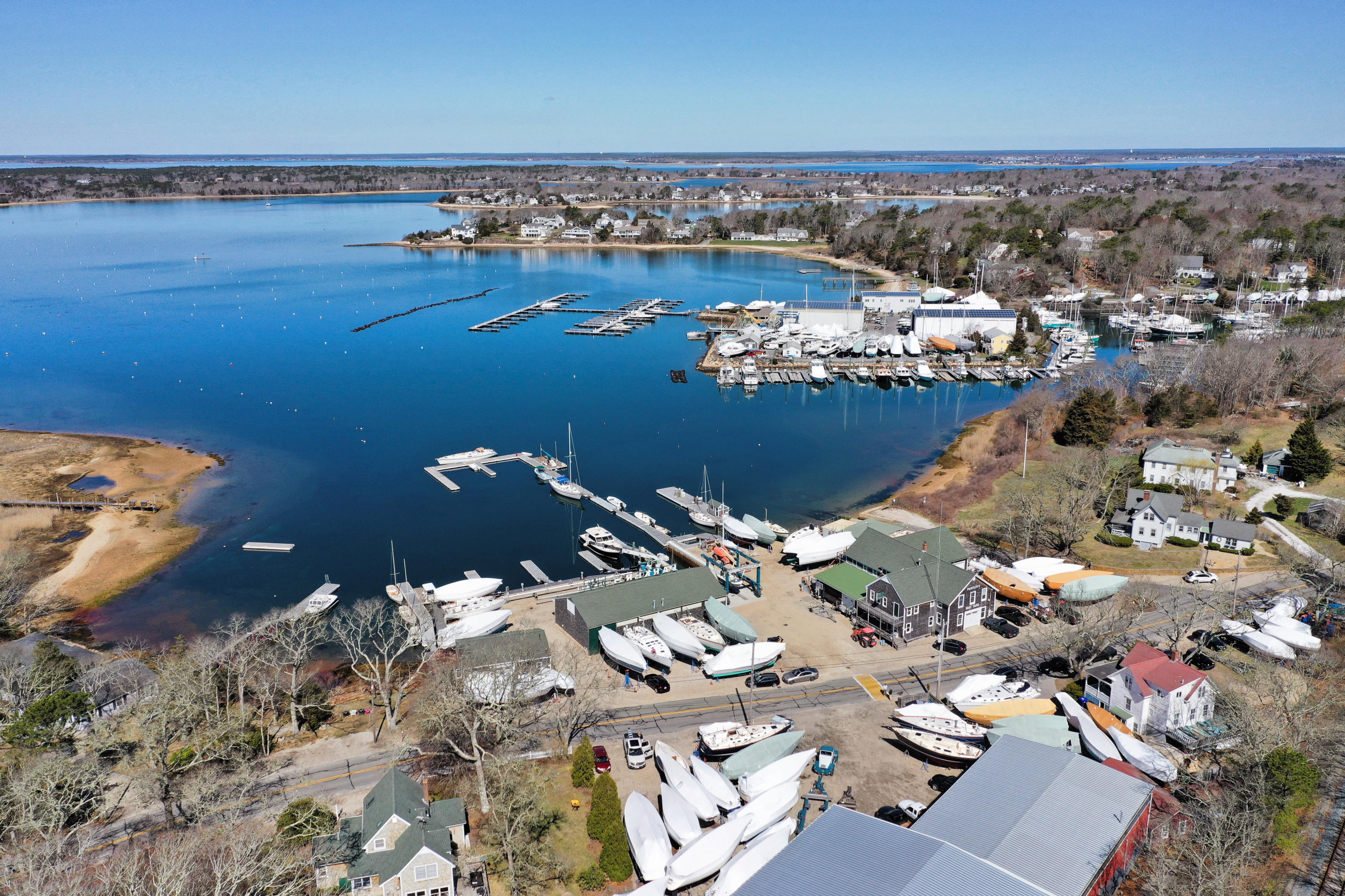 140 Scraggy Neck Road Cataumet, MA 02534 - Photo 2 of 39 an aerial view of a houses with outdoor space