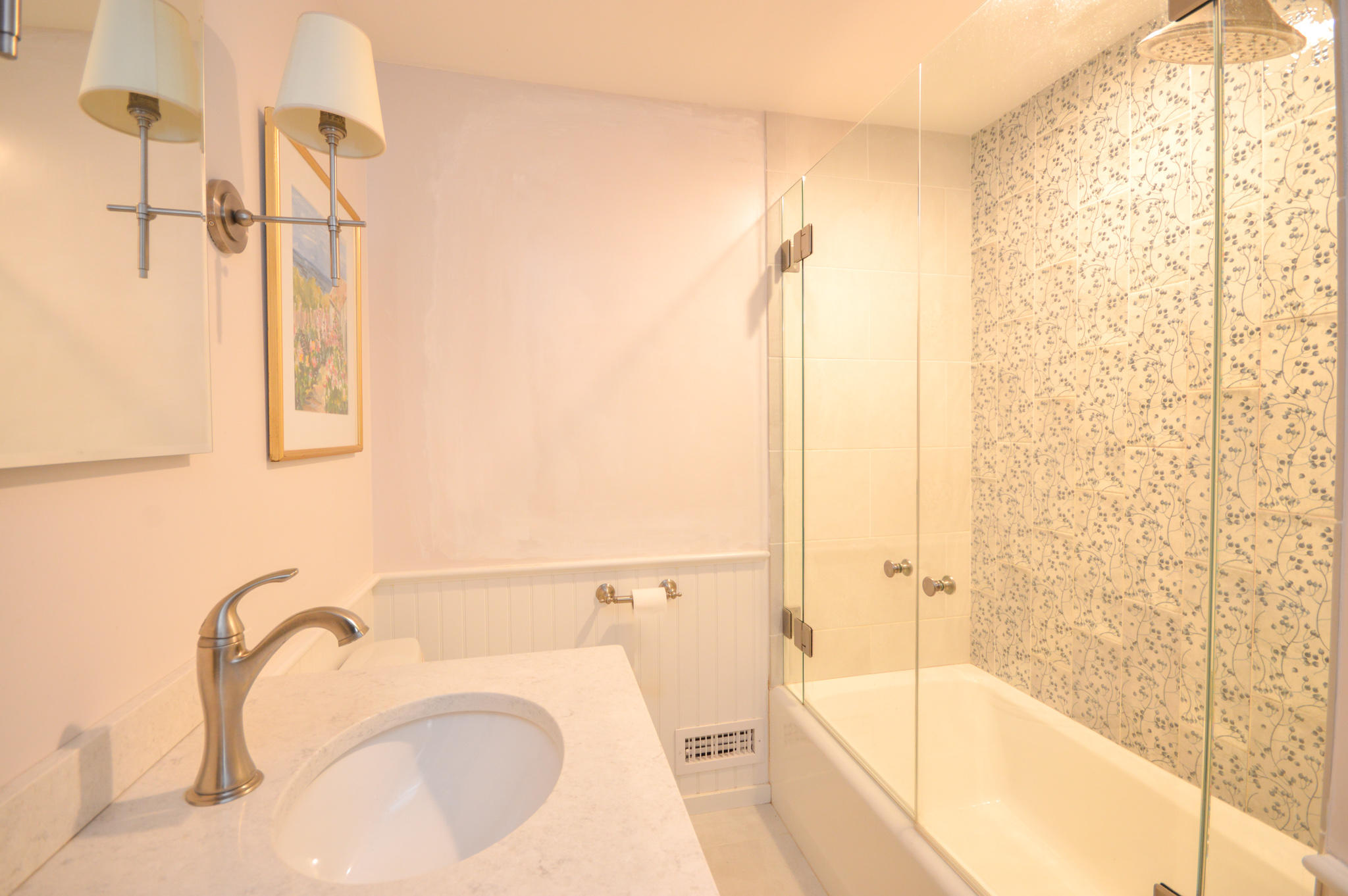 140 Scraggy Neck Road Cataumet, MA 02534 - Photo 23 of 39 a bathroom with a tub sink and a shower