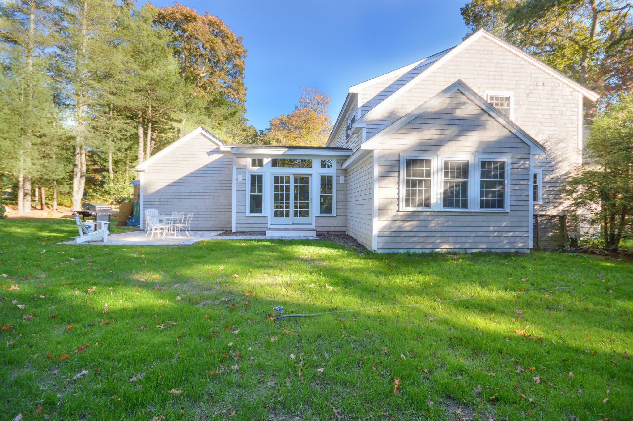140 Scraggy Neck Road Cataumet, MA 02534 - Photo 26 of 39 a view of a house with a backyard
