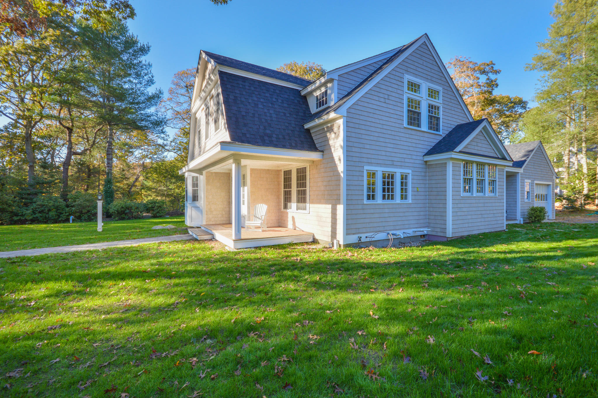 140 Scraggy Neck Road Cataumet, MA 02534 - Photo 27 of 39 a view of a house with a yard