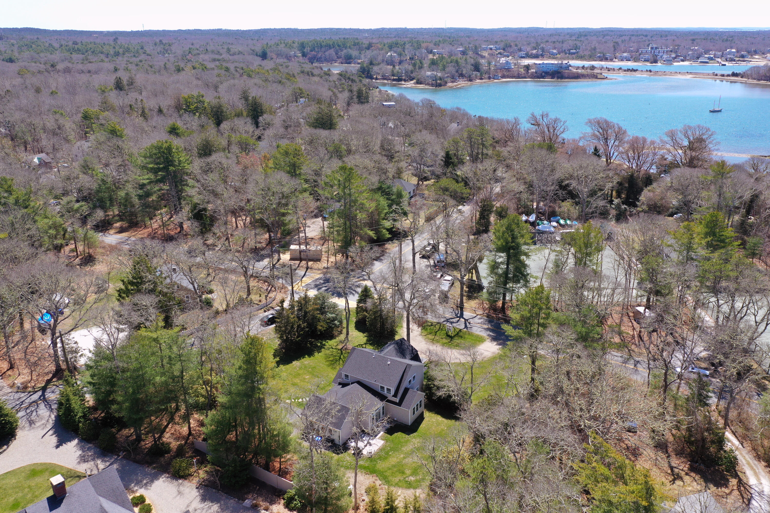 140 Scraggy Neck Road Cataumet, MA 02534 - Photo 3 of 39 an aerial view of lake and mountain view
