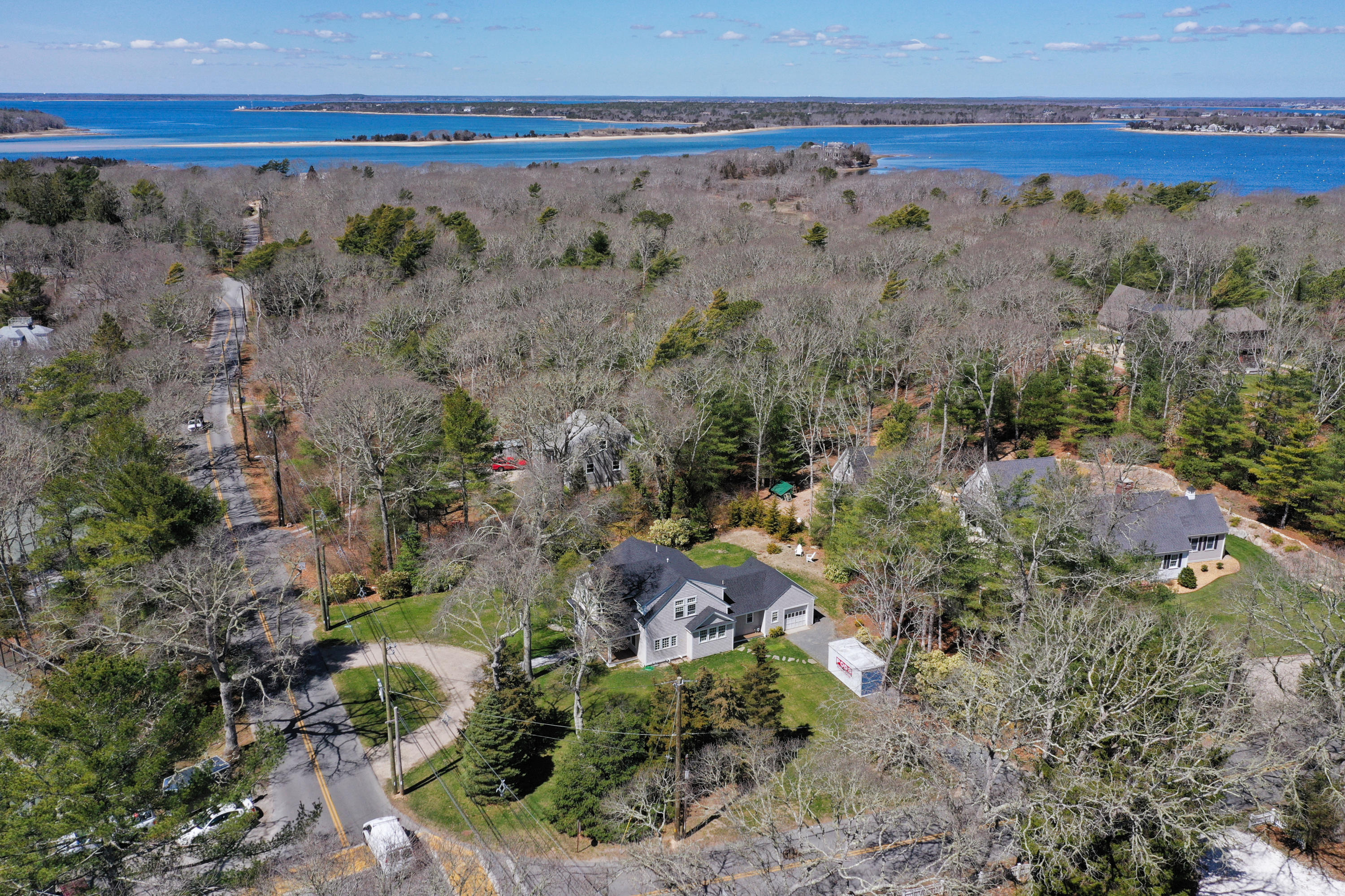 140 Scraggy Neck Road Cataumet, MA 02534 - Photo 6 of 39 a view of a pathway with a garden