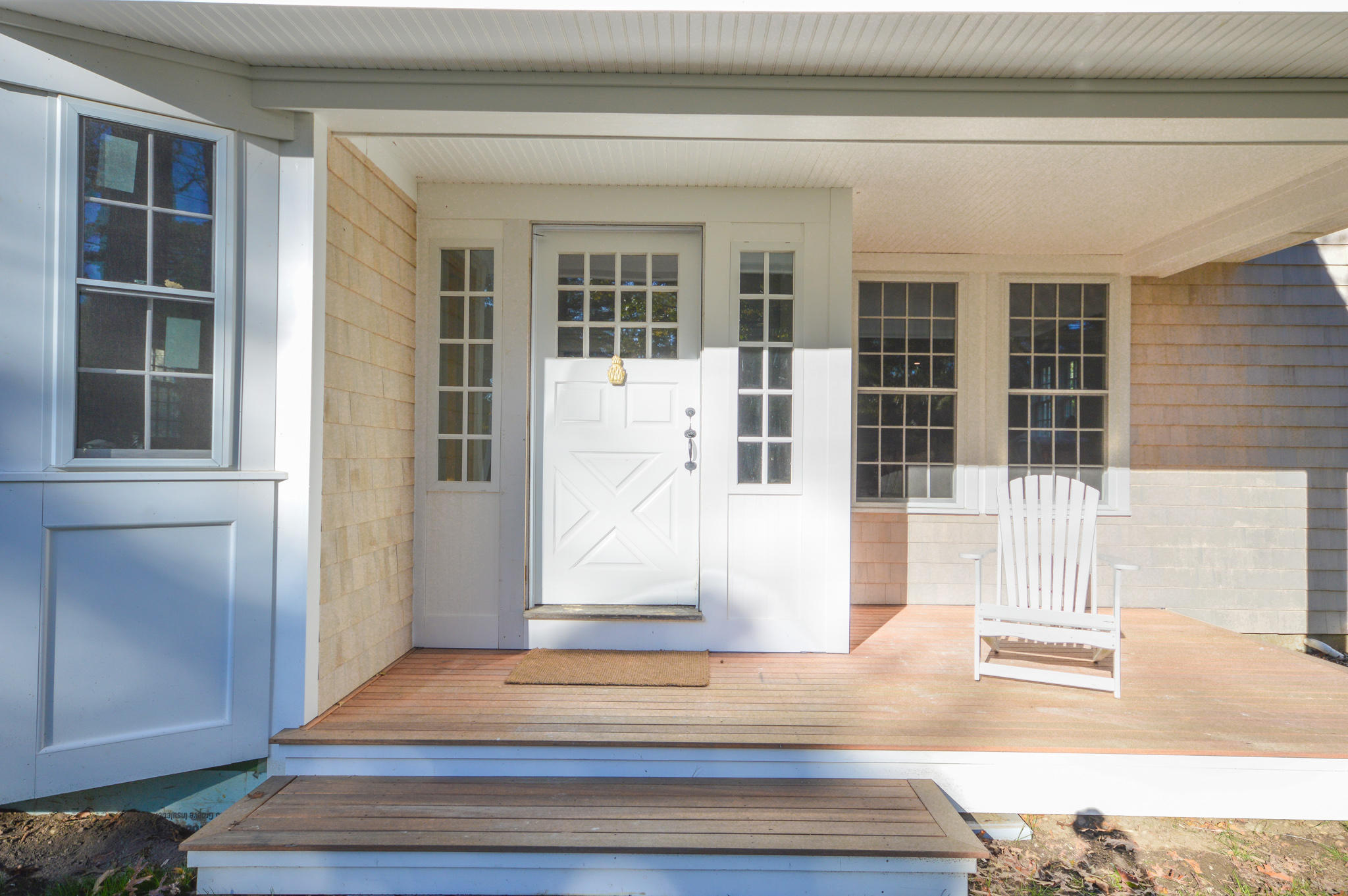 140 Scraggy Neck Road Cataumet, MA 02534 - Photo 9 of 39 a view of front door of house