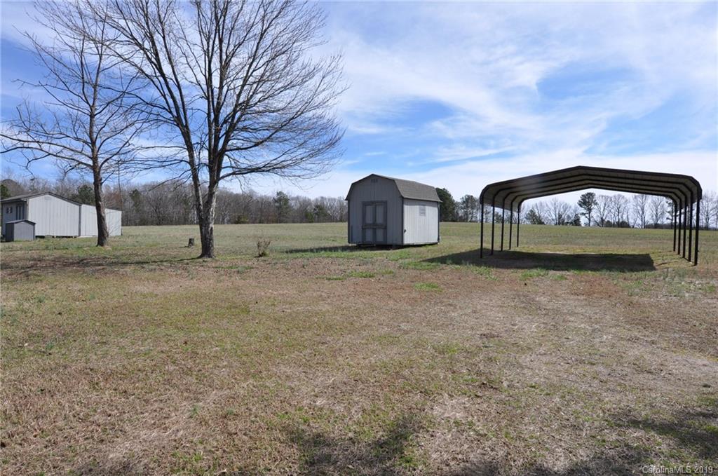 3088 Armenia Road Chester, SC 29706 - Photo 3 of 19 a view of a yard with wooden fence