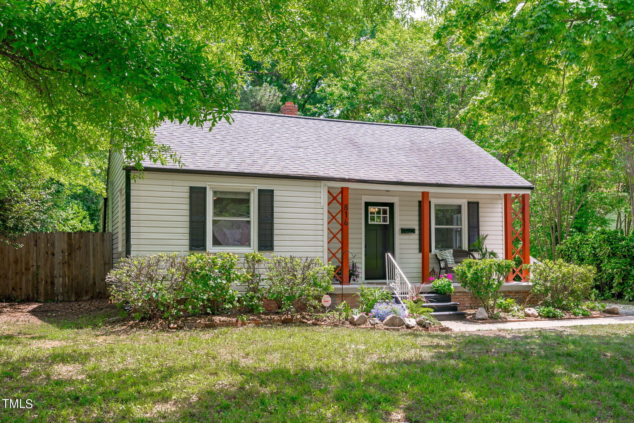 816 Colleton Road Raleigh, NC 27610 - Photo 2 of 49 a front view of a house with a yard and porch