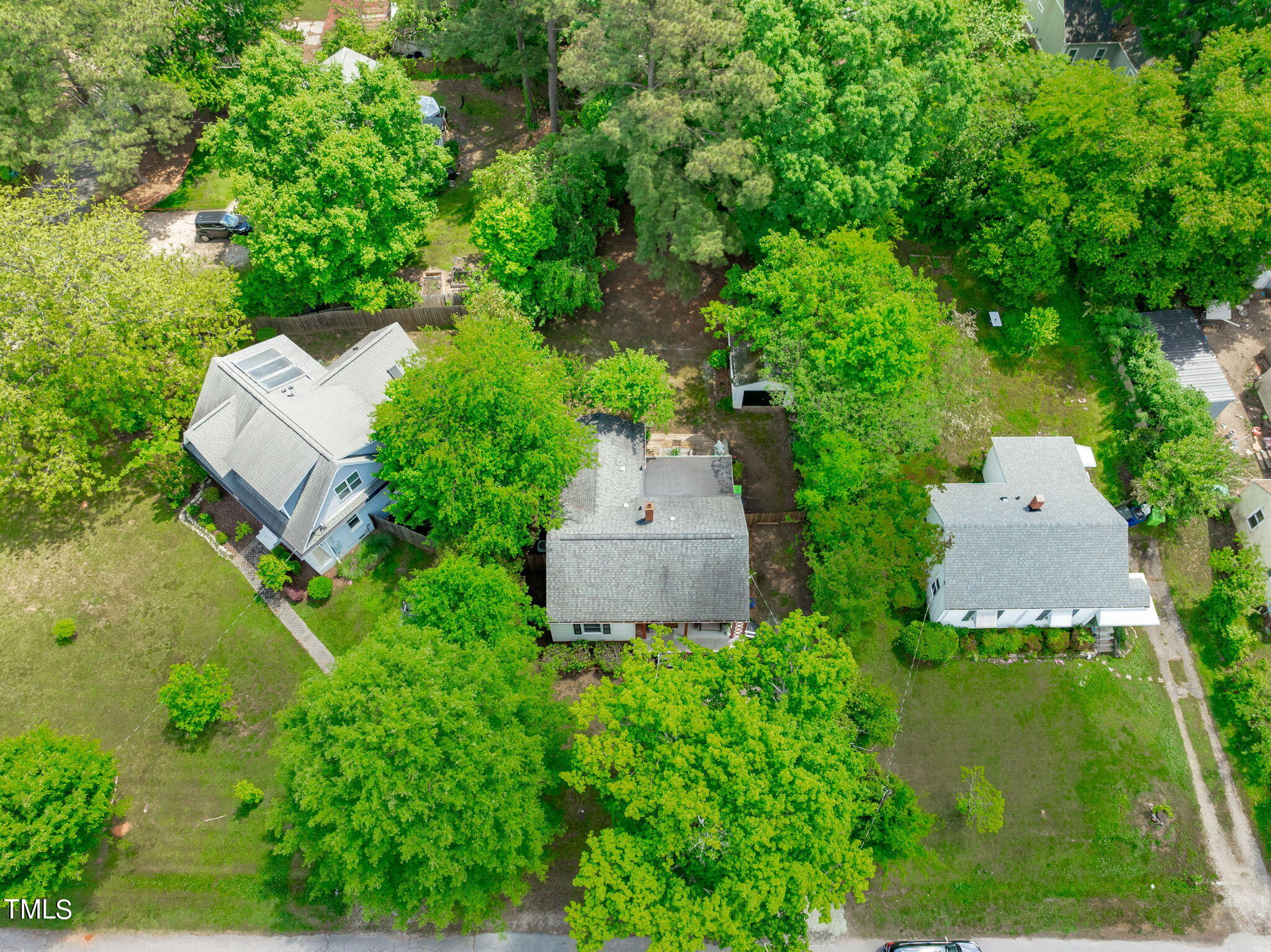 816 Colleton Road Raleigh, NC 27610 - Photo 33 of 49 an aerial view of a house with a yard and lake view