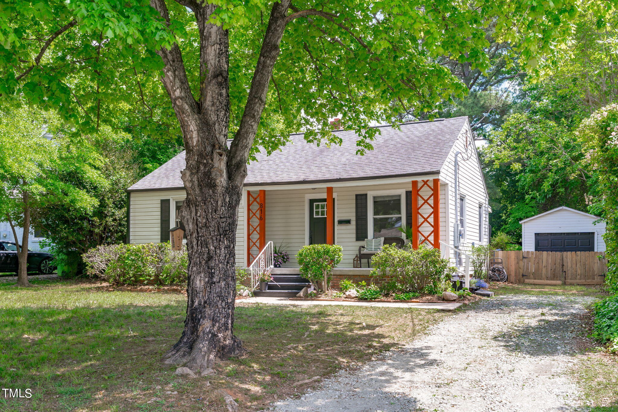 816 Colleton Road Raleigh, NC 27610 - Photo 5 of 49 a front view of a house with garden