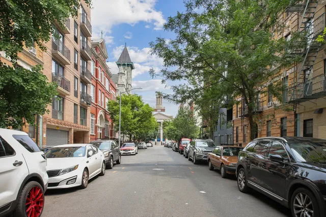 a car parked in front of a building