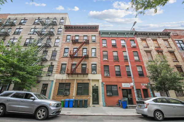 a bathroom with a sink a toilet and a bathtub