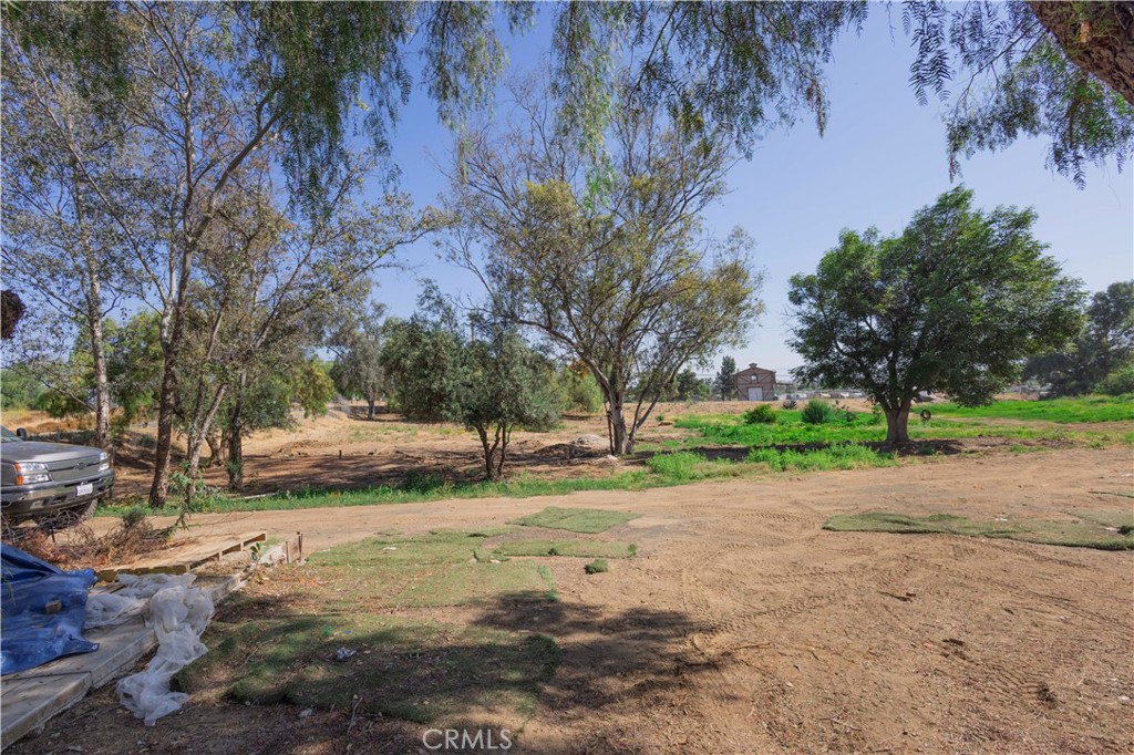 20530 Clark Street Perris, CA 92570 - Photo 18 of 25 a view of dirt yard with green space