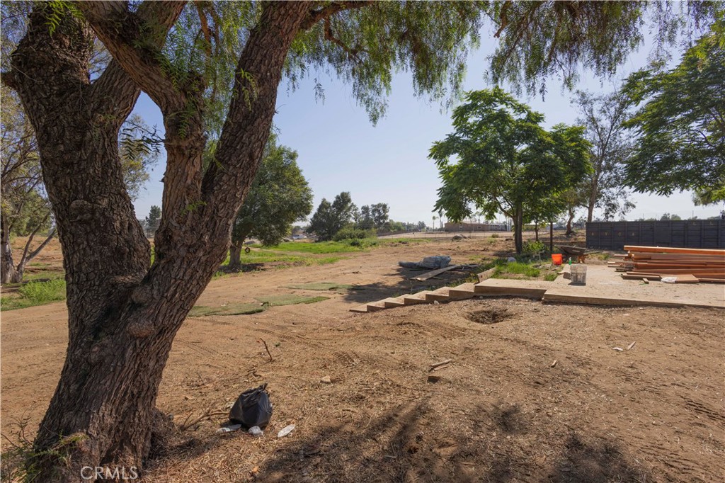 20530 Clark Street Perris, CA 92570 - Photo 19 of 25 a view of a yard with a tree