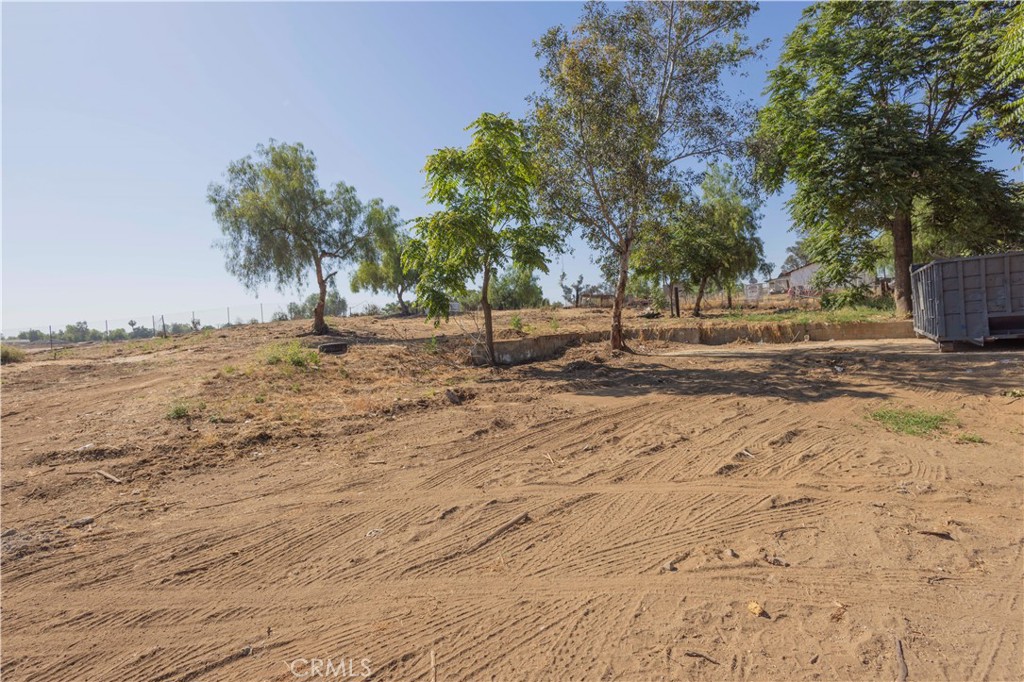 20530 Clark Street Perris, CA 92570 - Photo 21 of 25 a view of dirt yard with a trees
