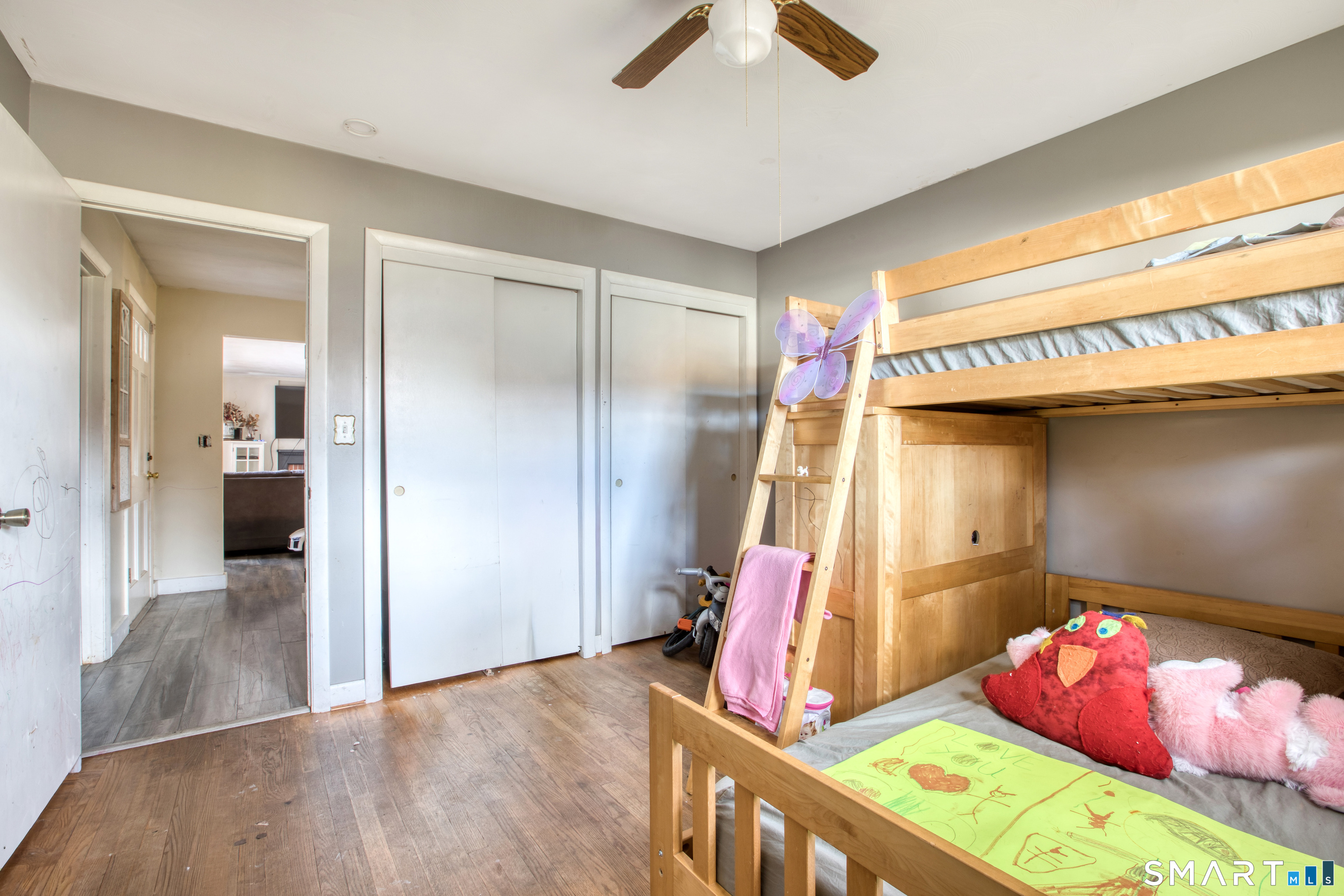 123 Andover Road East Hartford, CT 06108 - Photo 13 of 22 a bedroom with a bed and a chandelier