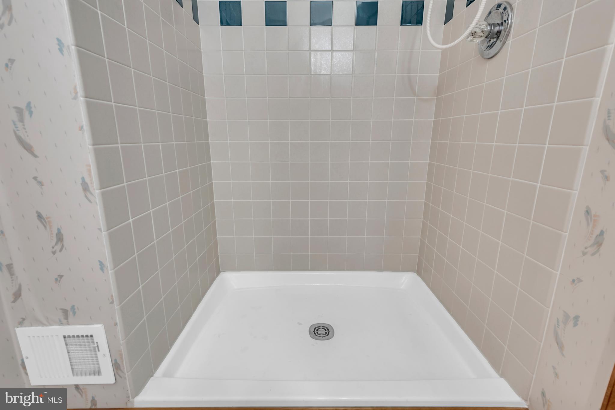 2407 Warm Spring Way Odenton, MD 21113 - Photo 31 of 45 a bathroom with a bath tub