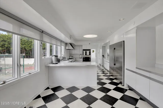 a view of a hallway with staircase