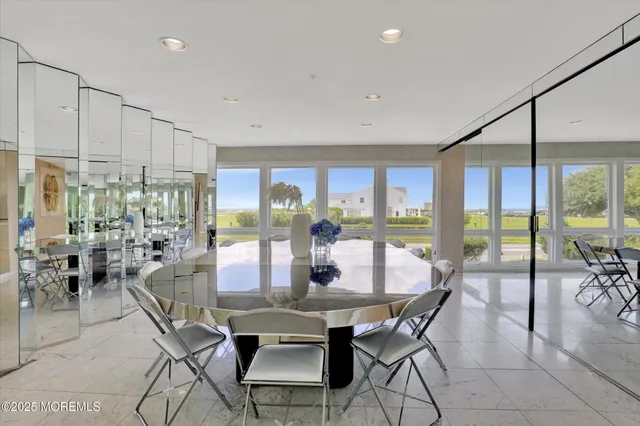 a bed room with a bed and a large window