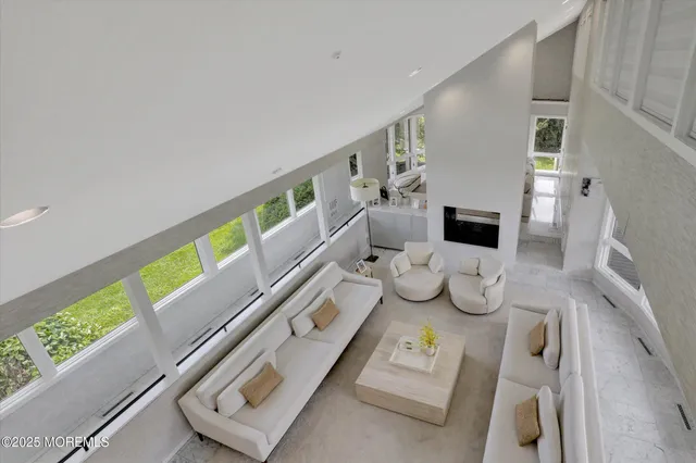 a bedroom with a bed and a television