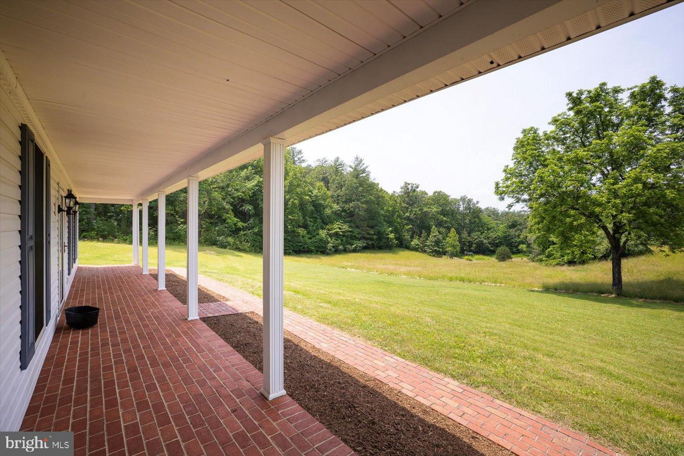 274 Aaron Mountain Road Castleton, VA 22716 - Photo 33 of 76 Serene porch with lush green views.