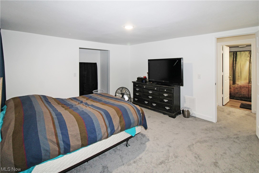 2148 Napoleon Road Fremont, OH 43420 - Photo 29 of 32 Bedroom featuring carpet