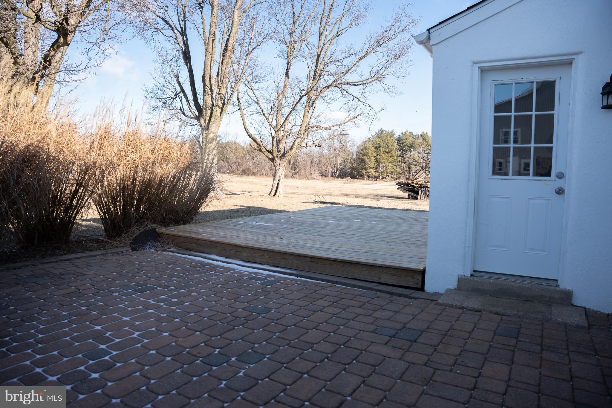 395 Bishop Hollow Road, Unit C Newtown Square, PA 19073 - Photo 18 of 28 a view of backyard with wooden fence