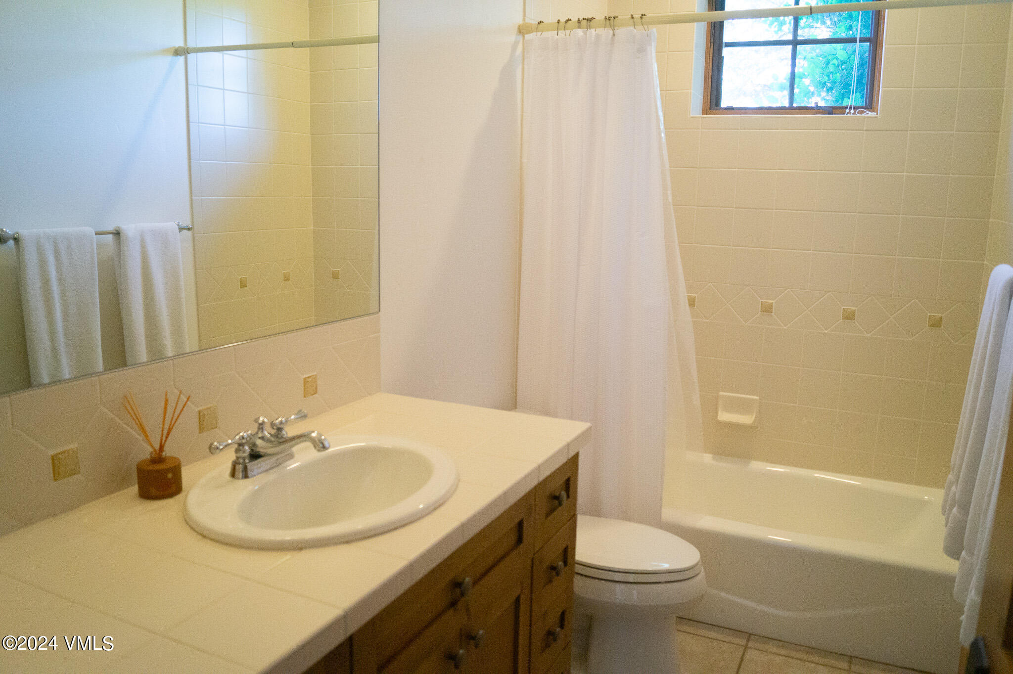 321 Legends Drive Edwards, CO 81632 - Photo 30 of 47 a bathroom with a sink a toilet and shower