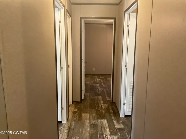 a view of a bathroom with a glass door