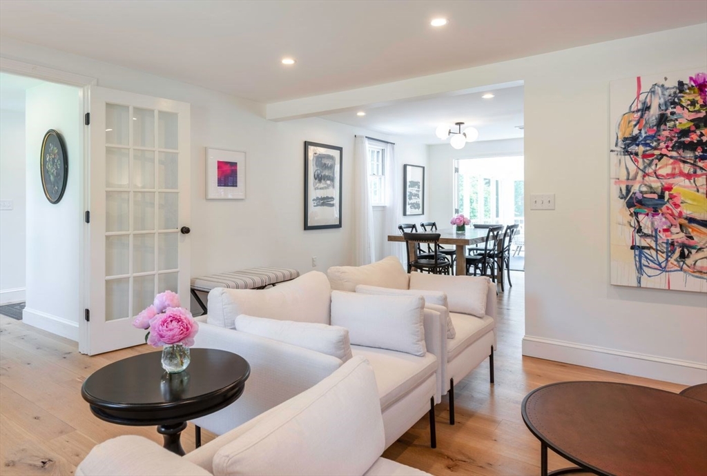 3 Jeffrey's Neck Road Ipswich, MA 01938 - Photo 11 of 42 a living room with furniture and flowers