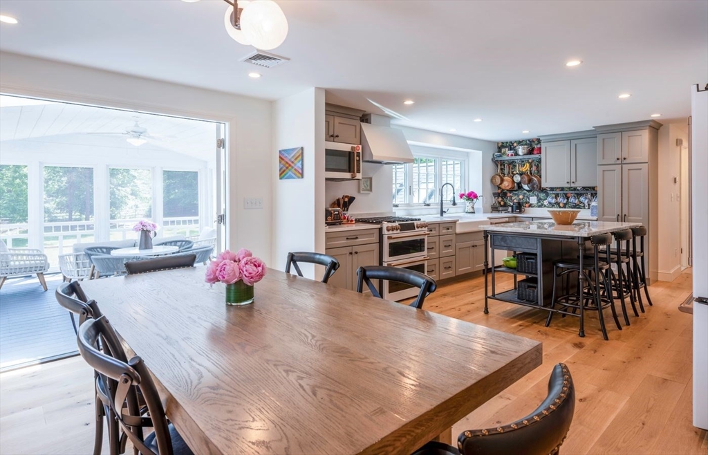 3 Jeffrey's Neck Road Ipswich, MA 01938 - Photo 12 of 42 a view of a dining room with furniture