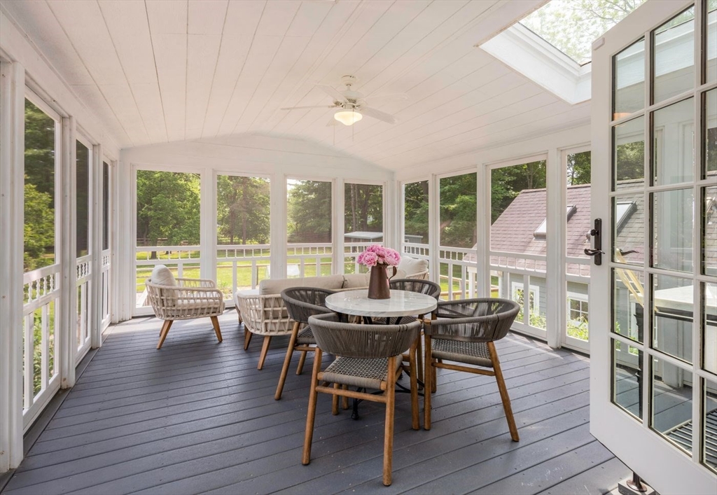 3 Jeffrey's Neck Road Ipswich, MA 01938 - Photo 17 of 42 a view of a dining room with furniture window and wooden floor