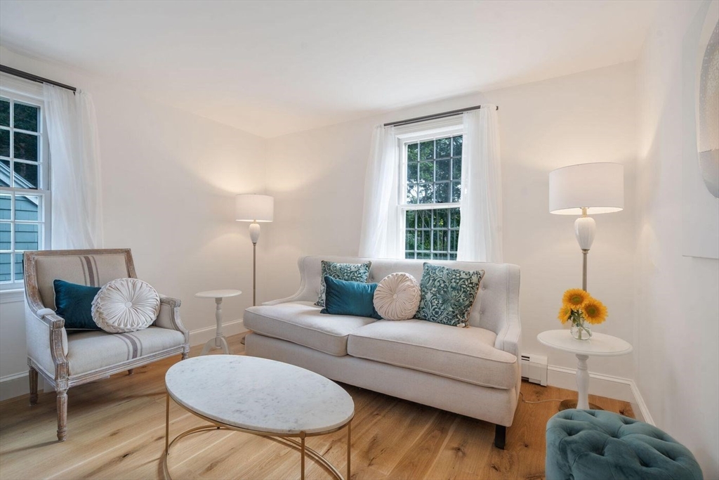 3 Jeffrey's Neck Road Ipswich, MA 01938 - Photo 24 of 42 a living room with furniture and a window