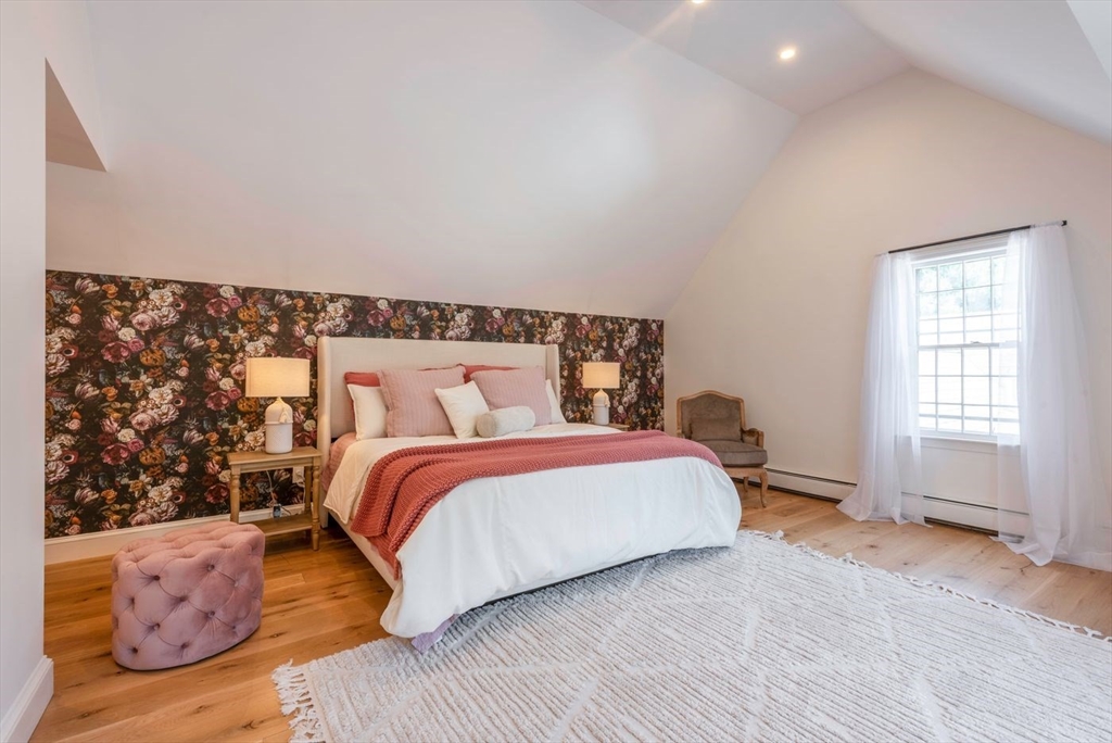 3 Jeffrey's Neck Road Ipswich, MA 01938 - Photo 25 of 42 a bedroom with a bed and window