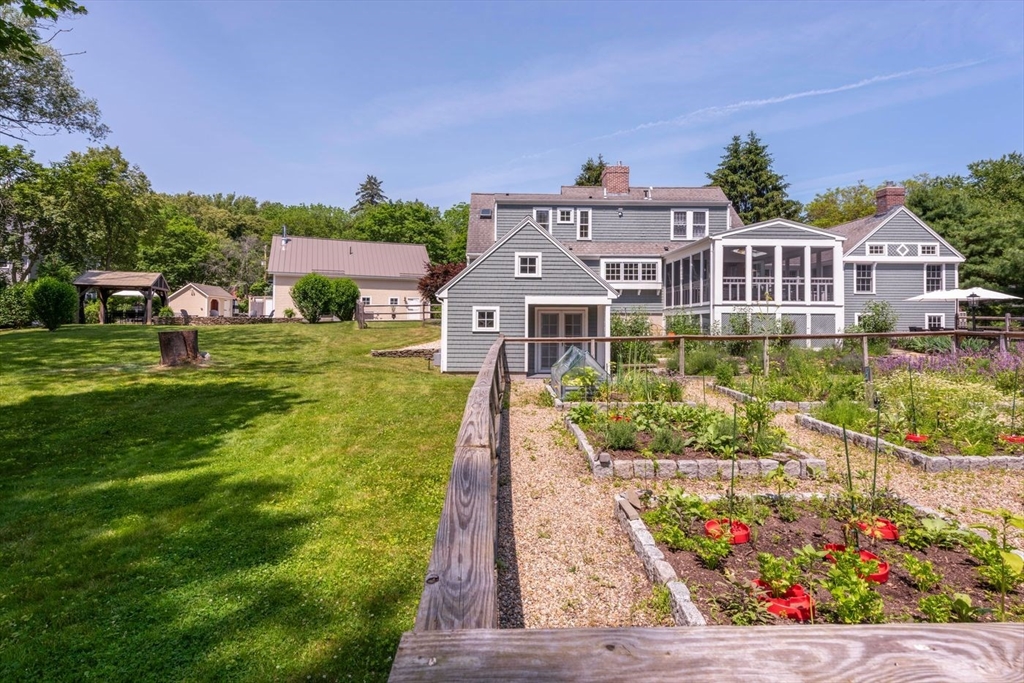 3 Jeffrey's Neck Road Ipswich, MA 01938 - Photo 33 of 42 front view of a house with a yard