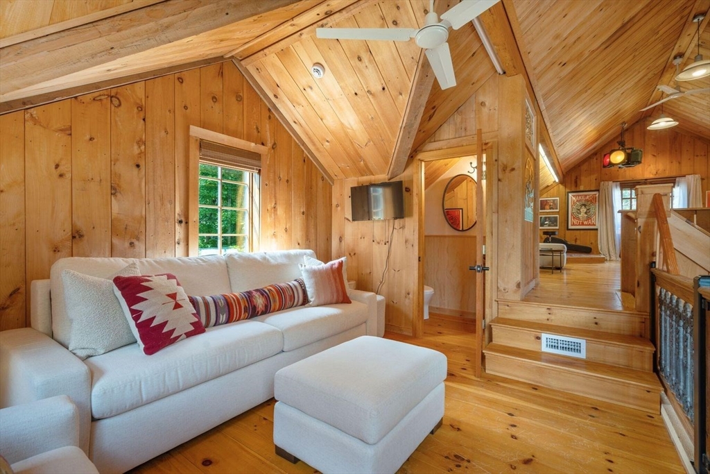 3 Jeffrey's Neck Road Ipswich, MA 01938 - Photo 40 of 42 a living room with furniture and a large window
