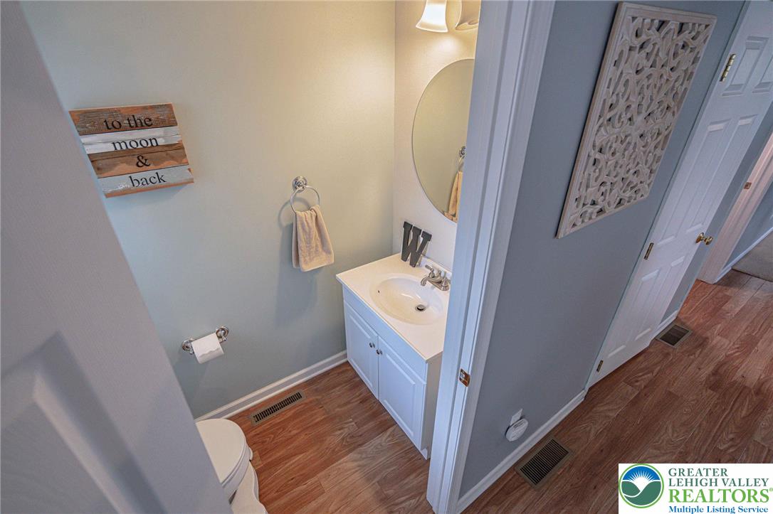 231 7th Avenue Bethlehem, PA 18018 - Photo 17 of 34 a bathroom with a bathtub sink and toilet