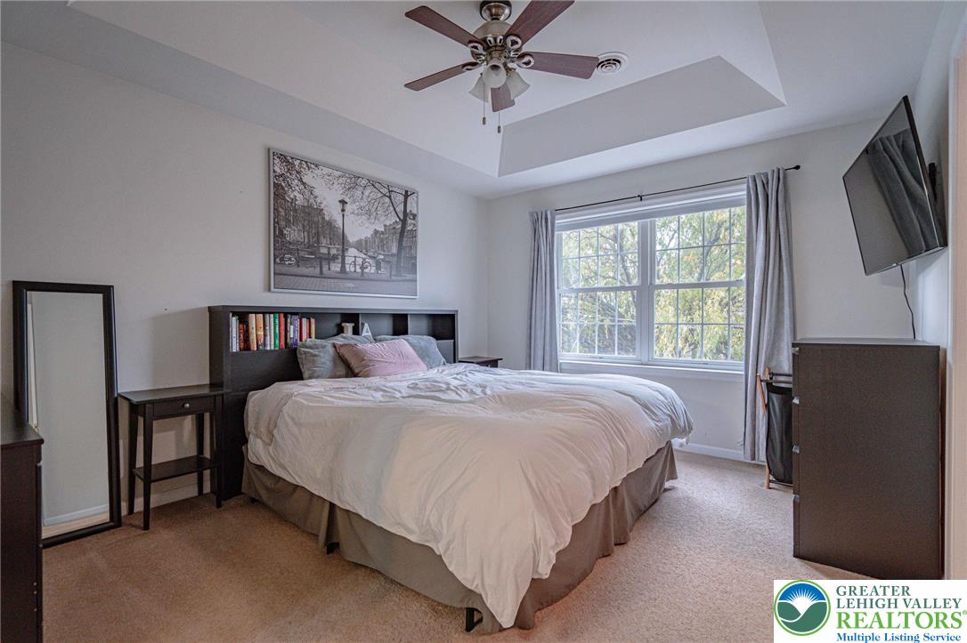 231 7th Avenue Bethlehem, PA 18018 - Photo 20 of 34 a spacious bedroom with a bed and a flat screen tv
