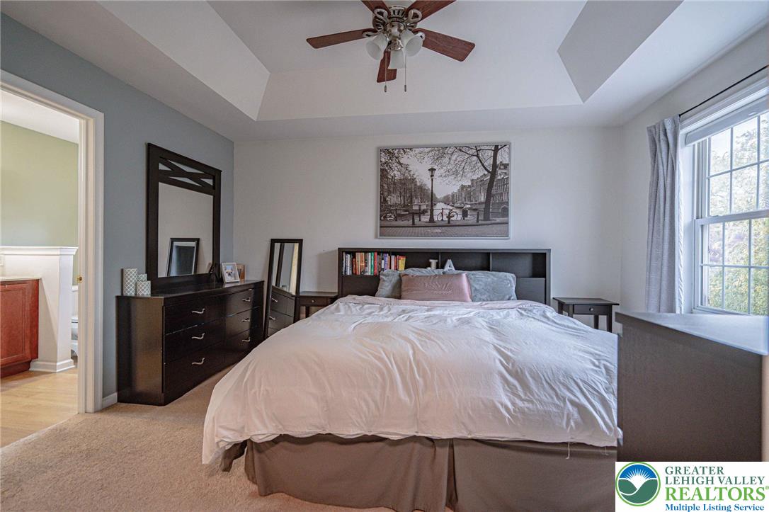 231 7th Avenue Bethlehem, PA 18018 - Photo 21 of 34 a spacious bedroom with a bed and a dresser