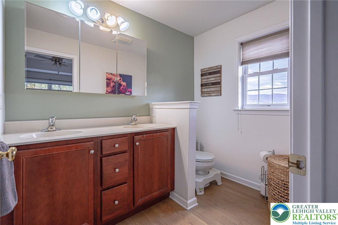 231 7th Avenue Bethlehem, PA 18018 - Photo 23 of 34 a bathroom with a sink and a toilet