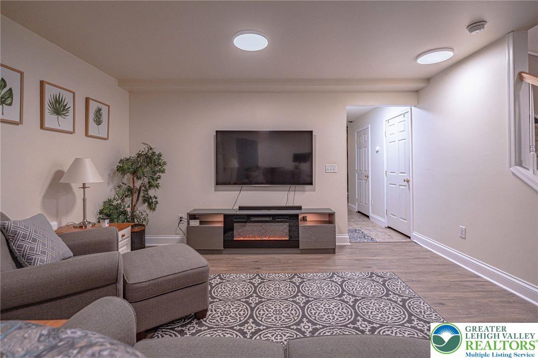 231 7th Avenue Bethlehem, PA 18018 - Photo 30 of 34 a living room with furniture and a flat screen tv