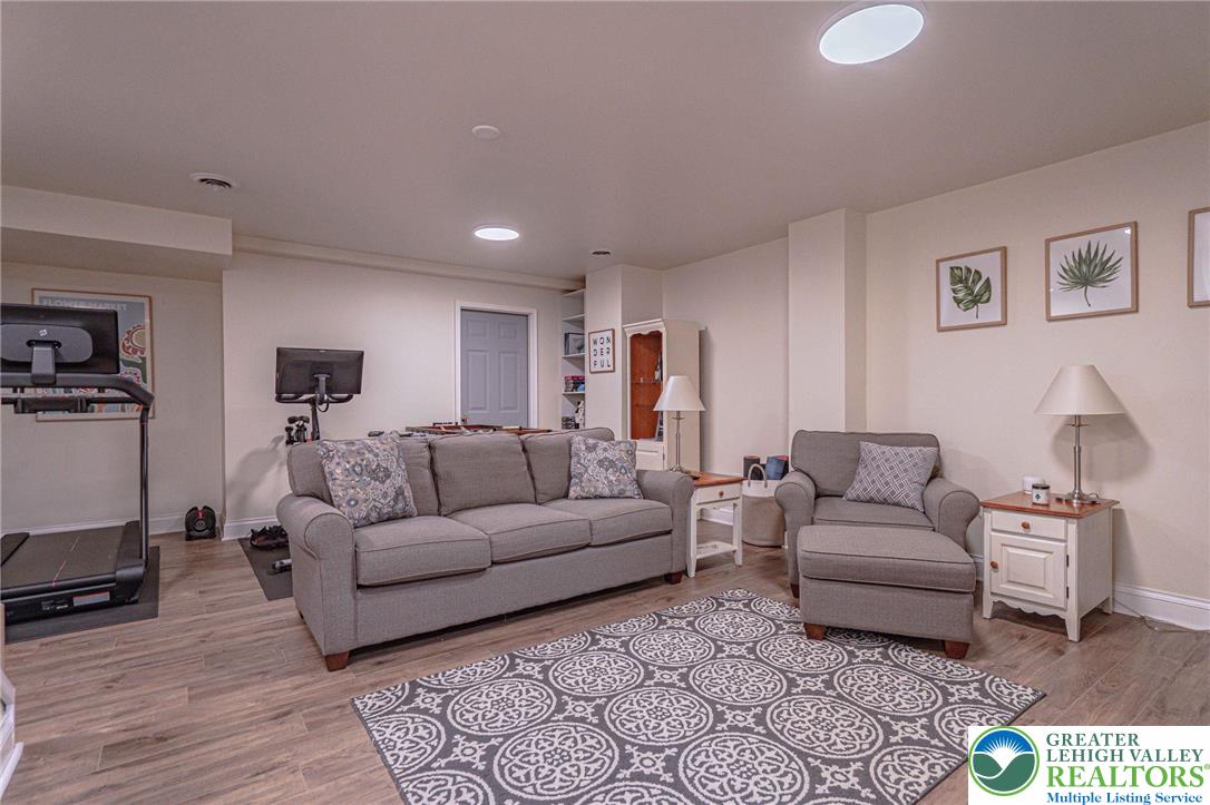 231 7th Avenue Bethlehem, PA 18018 - Photo 31 of 34 a living room with furniture and a wooden floor