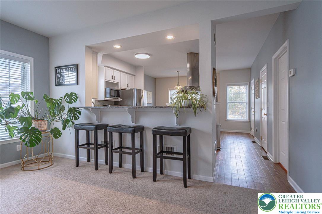 231 7th Avenue Bethlehem, PA 18018 - Photo 9 of 34 a view of a dining room with furniture and a chandelier