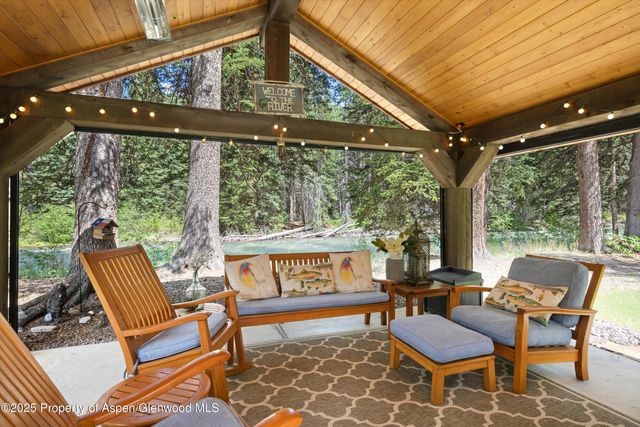a outdoor living space with patio furniture and a potted plant