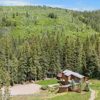 a view of a garden with an trees