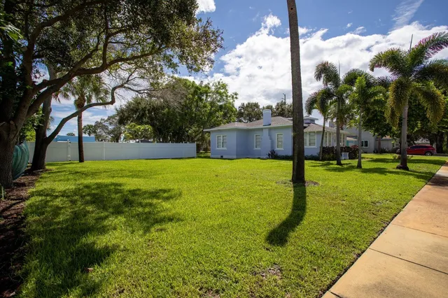 a view of a backyard with a garden
