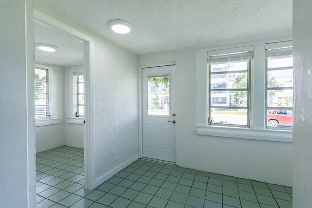 a view of an empty room with window